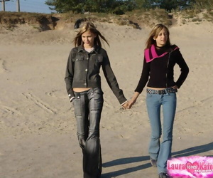 Youthfull lesbians Katrina & Laura smooch outdoors before..