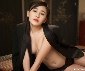 Asian goddess Wu Muxi posing for bare playboy pictures..