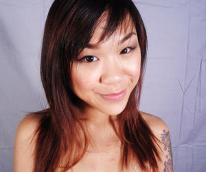 Asian brunette Minnie undressing..