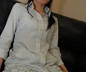 Asian lady Satomi Fujiki gets naked and enjoys pussy toying action