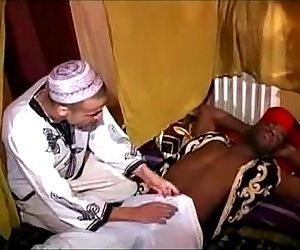 A top black guy is fucking a bottom arab boy !
