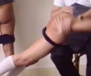 Two school girls spanked otk on their barebottoms by their teacher