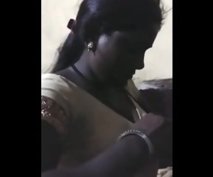 Desi tamil aunty striping saree and shows her body