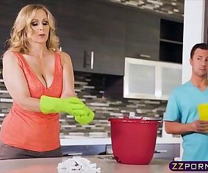 Busty blonde MILF fucks with her stepson in the kitchen