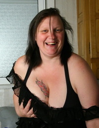 Obese older lady Katty A whips out her hefty knockers..