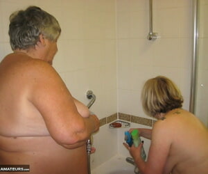 Grandma Libby and her lesbo lover wash each other during a..