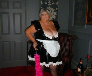 Big old maid Grandma Libby doffs her uniform to pose bare..