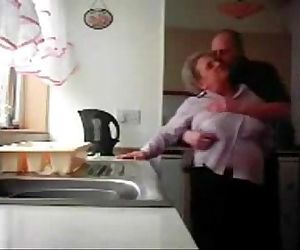 LOL. Mum and daddy caught having fun in the kitchen. Hidden cam - 3 min