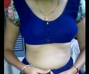Desi hot wife disrobing Blue Saree Full Nude - IndianHiddenCams.com - 58 sec HD