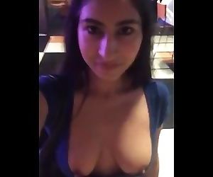 Pakistani university girl demonstrating boobs in Public