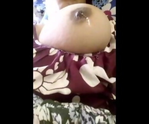 Horny desi aunty pressing huge tits