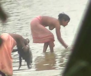 Indian women bathing by the river - 3 min