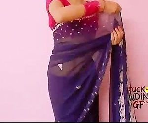 young indian wife teaching how to wear saree - 1 min 4 sec
