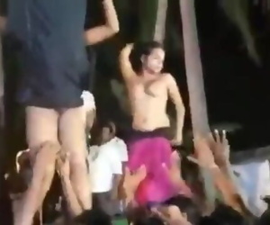 Naked stage dance in public
