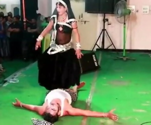 Indian Lady Trampling Man in Dance in Public