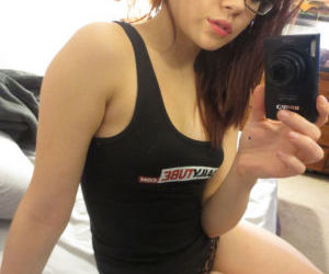 Nerdy Jap amateur Sydney Mai taking self shots of her exposed titties