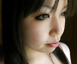 Asian babe Fumika Murase undressing and showcasing her juicy gash in close up