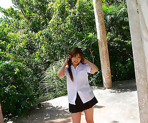 Japanese schoolgirl removes uniform - part 2834