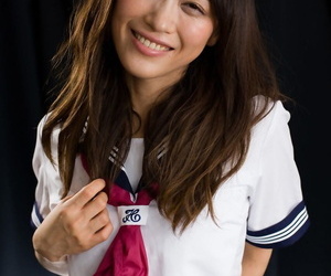 Cute Japanese girl endures a hardcore face fuck in her sailor uniform