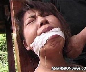 Tied up mature Asian cougar to a..