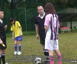 Asian soccer player gets a yellow..