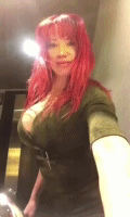 redhead in green dress