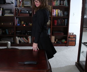 MILF over 40 Joanie Bishop is a sexy secretary in pantyhose and skirt