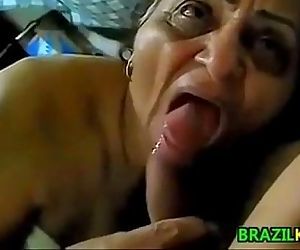 Brazilian Granny Sucking On A..