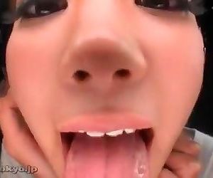 Asian Girl Licks Camera