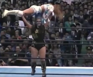 BULL NAKANO OVERHEAD LIFTS HER OPPONENT