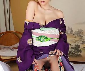 Big tits yuma asami posing in traditional japanese dress -..