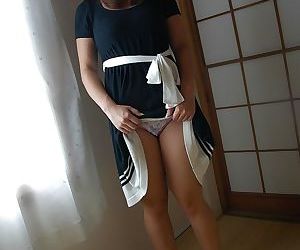 Asian MILF Ayumi Chiba undressing and exposing her pussy..