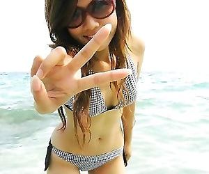 Sexy asian ex-girlfriend posing in a bikini outdoors -..