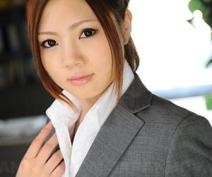 Japanese businesswoman Iroha Kawashima bares her bra..