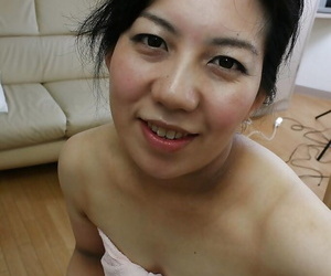 Lusty asian mature lady has some pussy fingering fun after..