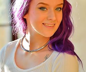 Teen girl with purple hair..