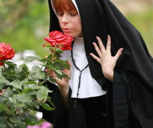 Redheaded nun Penny Pax shows off..