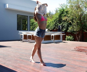 Leggy teen babe Kylie Quinn strips off shorts and bikini..