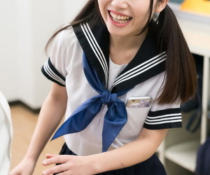 Cute Japanese schoolgirl lifts her skirt to masturbate for..