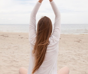 Caucasian teen Matilda Sun gets naked while doing yoga at..