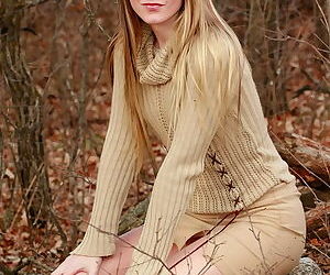 Girl outdoors in a tasty turtleneck sweater teasing with her pussy