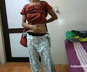 Indian Bhabhi in Brown Shalwar Suit Changing in Bedroom