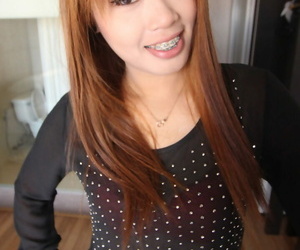 Chinese redhead Ming shows her braces before a POV fuck..