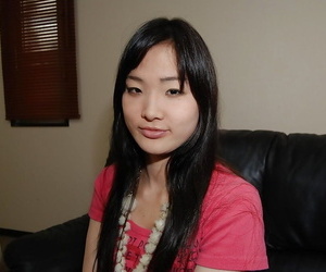 Long-haired asian teenage Aika Tanuma disrobing and..