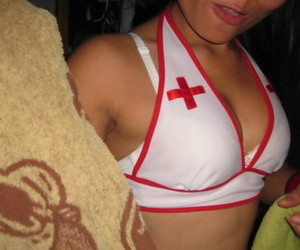Little Thai female Ping eliminates nurse clothing before..