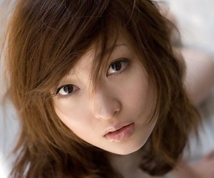 Japanese teen Maiko Kazano wets her mischievous boobs and..