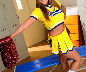 Adorable Japanese cheerleader unveils crazy tits before..