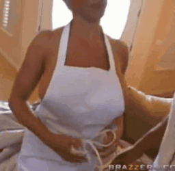 Milf wearing only apron