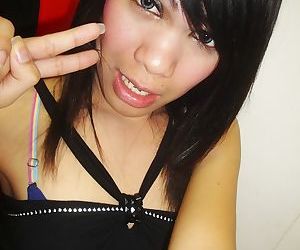 Amateur photos of young Asian ladyboy getting naked with..
