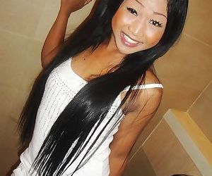 Bathroom flashing session featuring smiling Asian tranny..